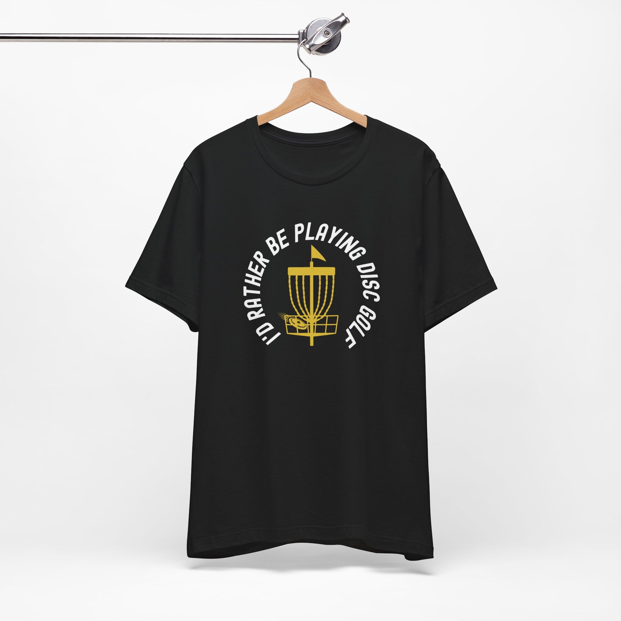 Black t-shirt with a graphic of disc golf chains, basket, and disc and text that says "I'd Rather Be Playing Disc Golf" on a hanger against a white background