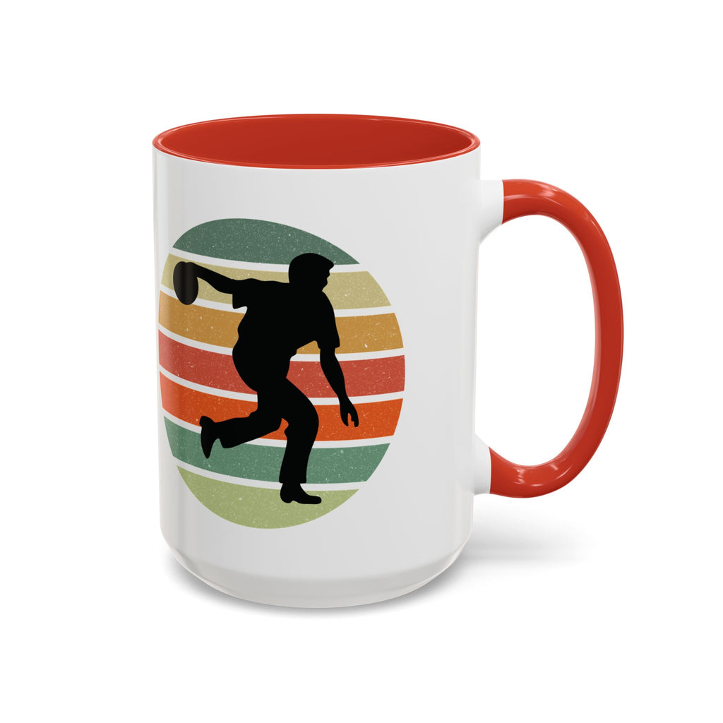 Ceramic coffee mug with red accents on the handle and inside, with a graphic of a silhouette of a bowler over a colorful retro image, on a white background.