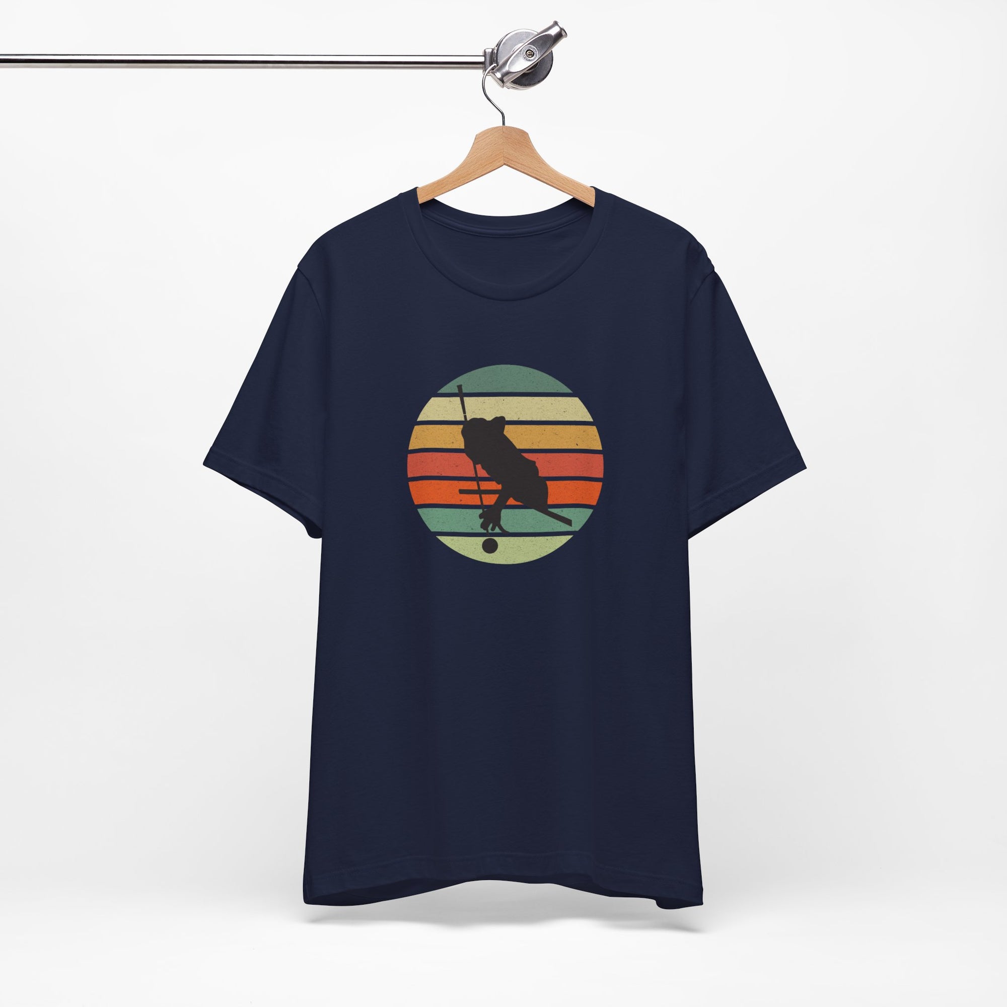 Navy blue t-shirt with a graphic of a billiards player silhouette over a colorful retro image against a white background