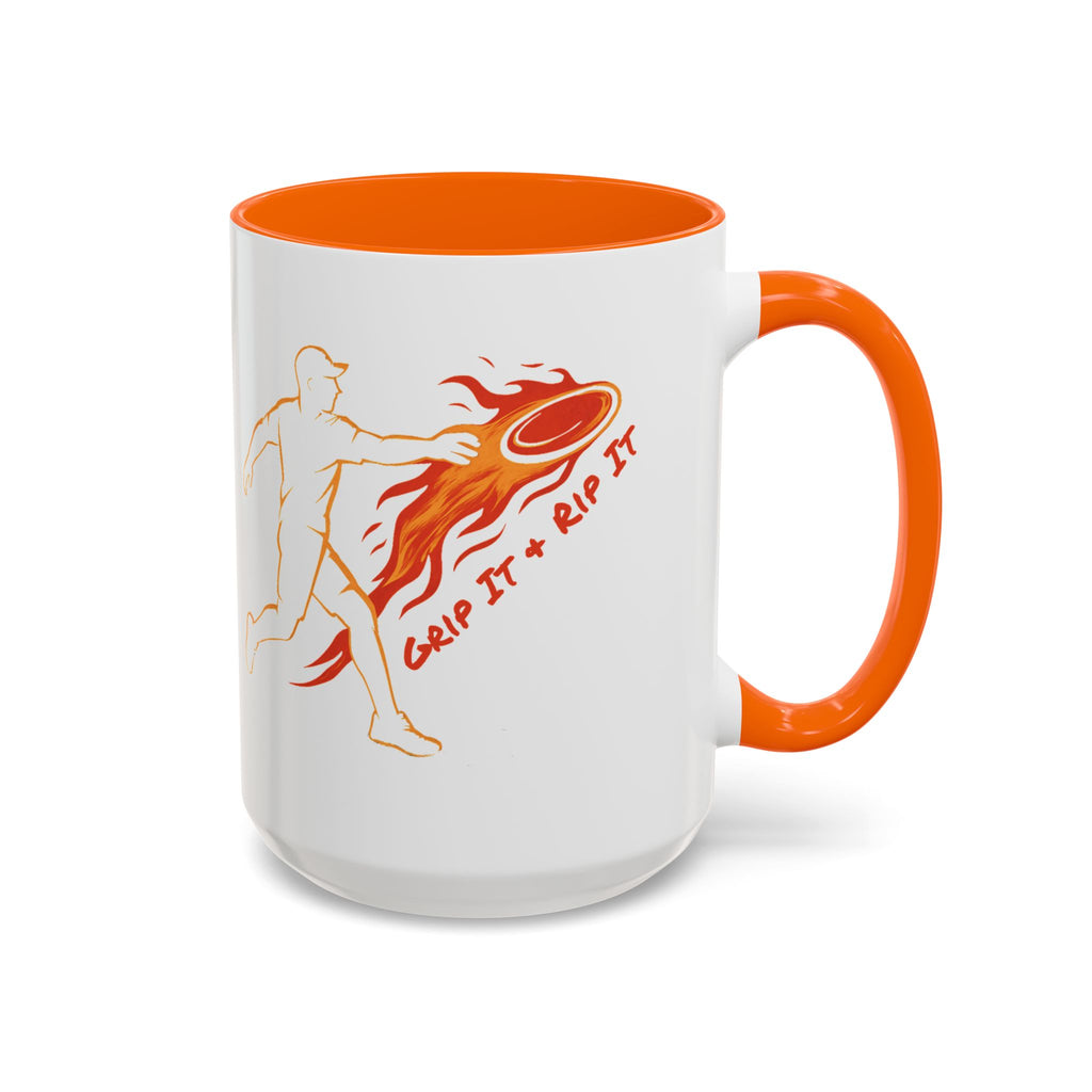 A ceramic coffee mug with orange accents on the handle and interior, featuring a graphic design of a person throwing a disc golf disc with flames coming off the disc and text 'Grip It or Rip It' against a white background.