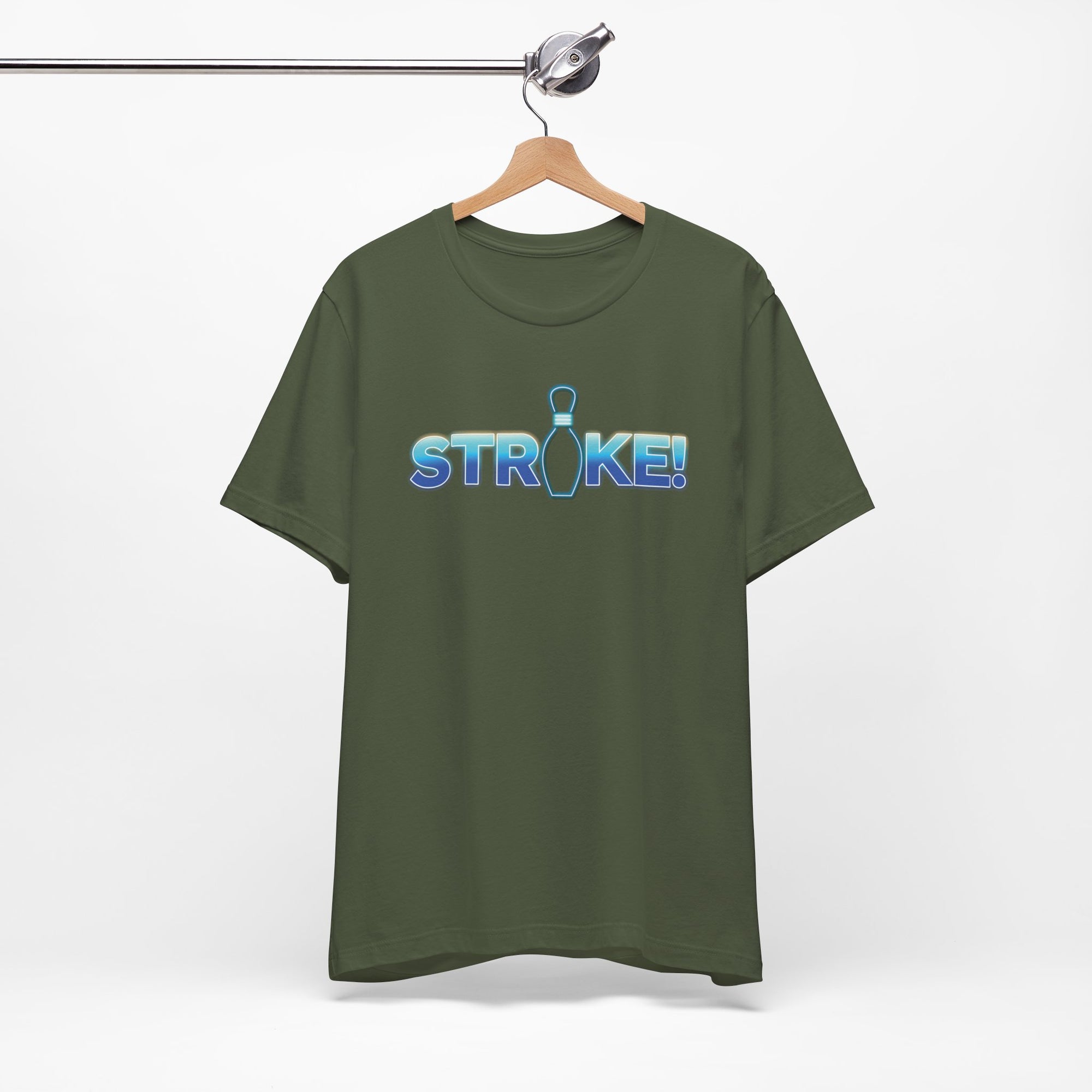 Military green bowling t-shirt with 'STRIKE!' with the "I" replaced by a bowling pin, on a hanger against a white background