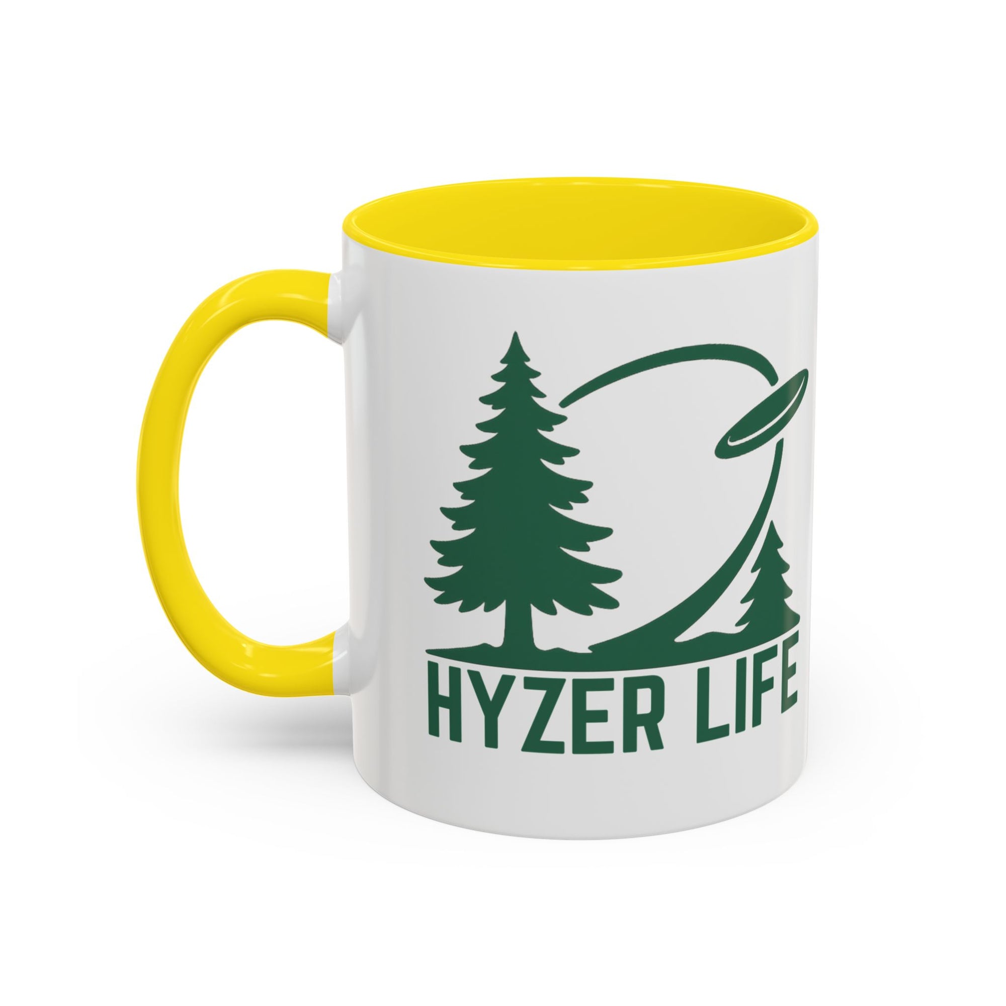 Ceramic coffee mug with yellow accents on the handle and interior, with green graphic of trees and a disc golf flying with the words 'HYZER LIFE' below the image, against a white background