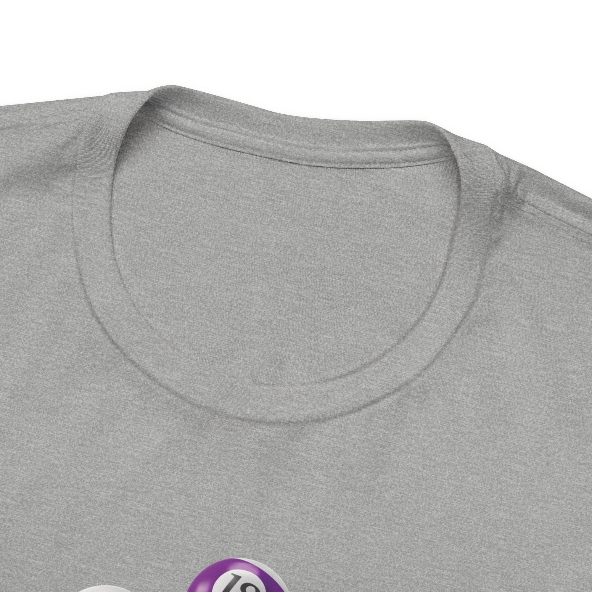 Close-up view of the neckline of a gray t-shirt with the text "Billiards Time" surrounded by a clock made up of colorful billiard balls and cue sticks, on a white background