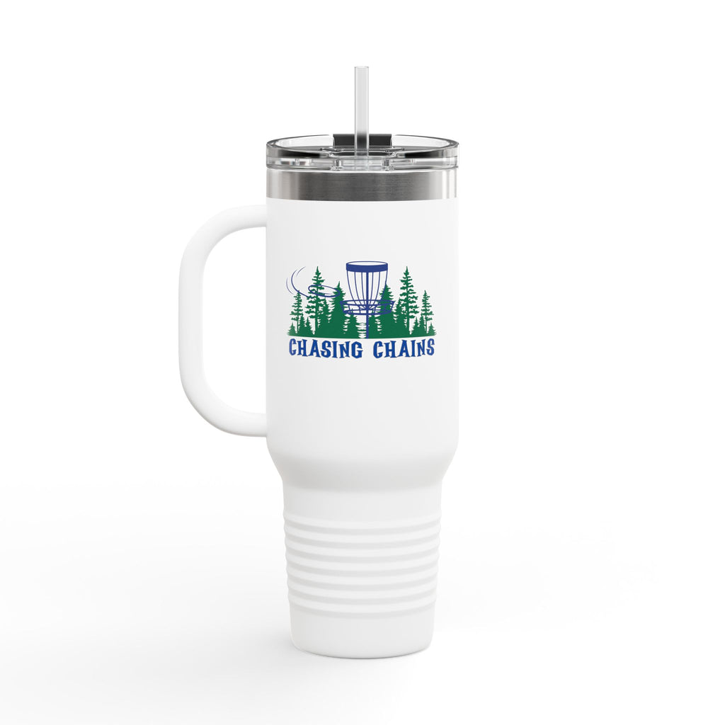 A white 40oz travel tumbler with lid and straw, with 'Chasing Chains' graphic featuring a flying disc golf disc and basket and chains in front of a scenic evergreen tree landscape, against a white background