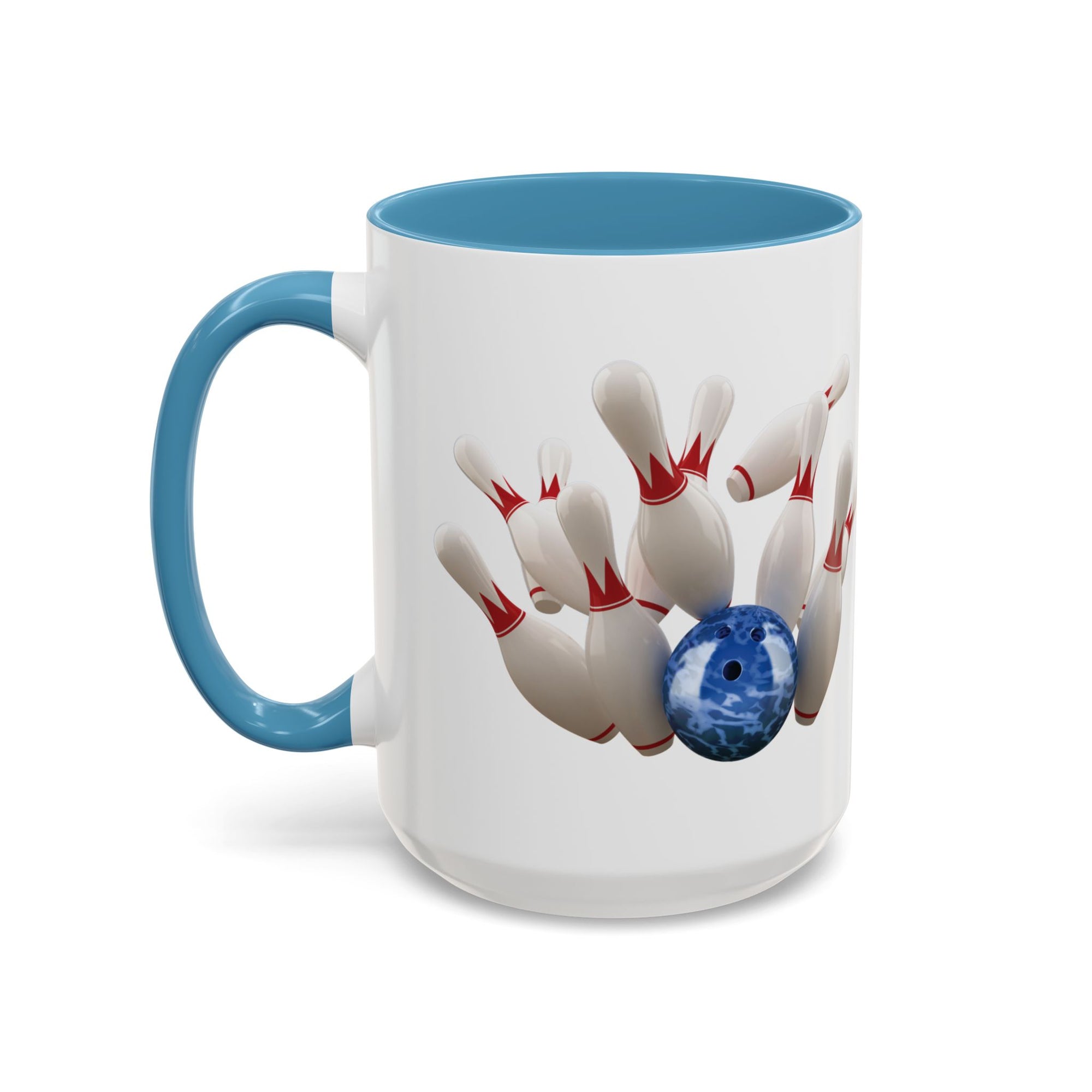 A white ceramic coffee mug with light blue accents on the handle and interior, with a graphic of a blue bowling ball knocking over bowling pins, on a white background
