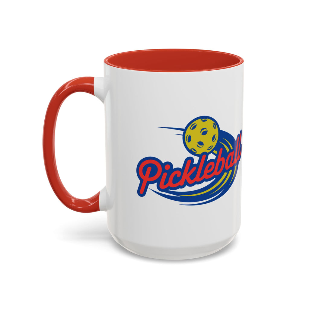 Ceramic coffee mug with red accents on the handle and interior, with a classic pickleball logo featuring the word pickleball and a yellow pickleball with motion lines, against a white background