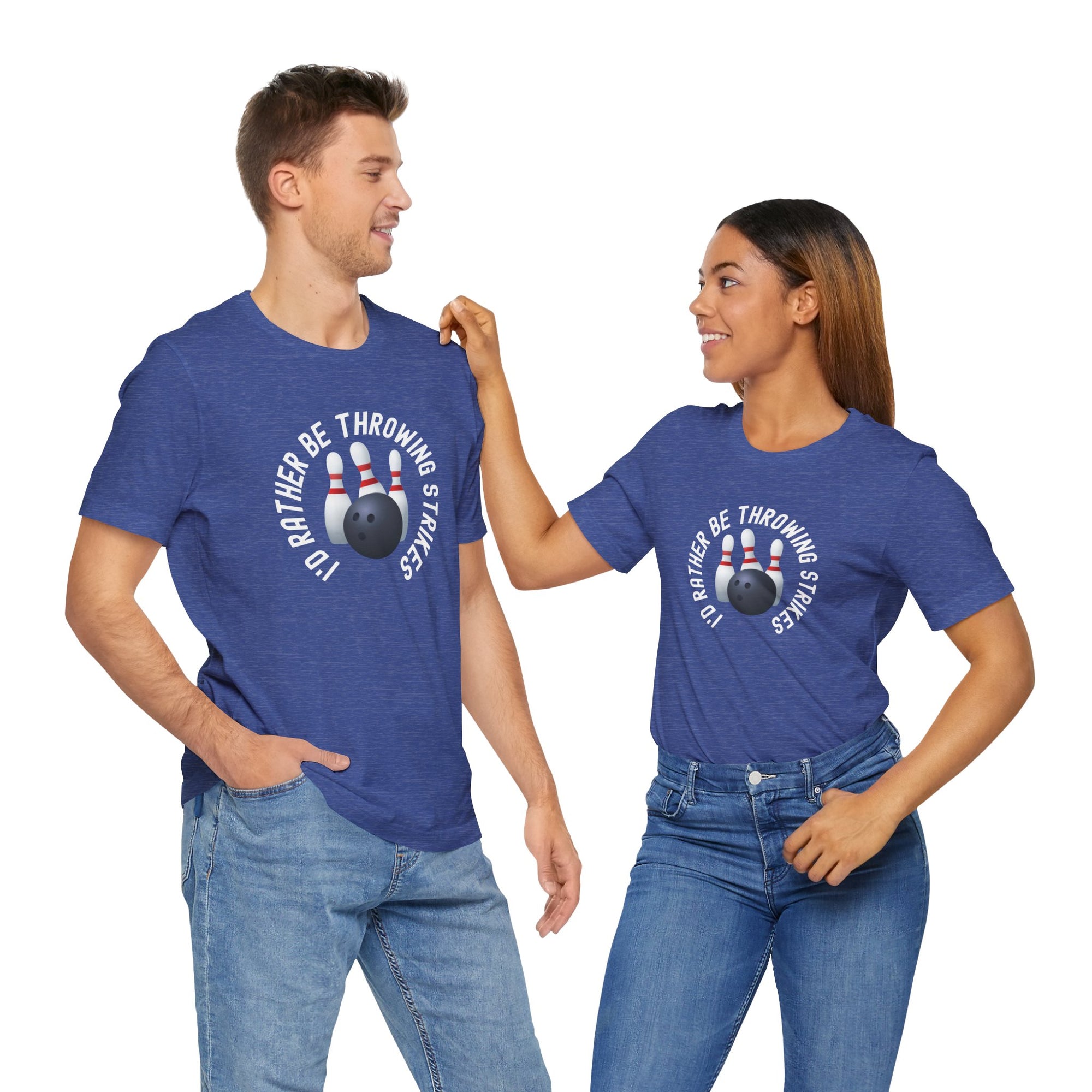A man and a woman both wearing a blue t-shirt with bowling pins and a bowling ball and text saying "I'd Rather Be Throwing Strikes" on a hanger against a white background
