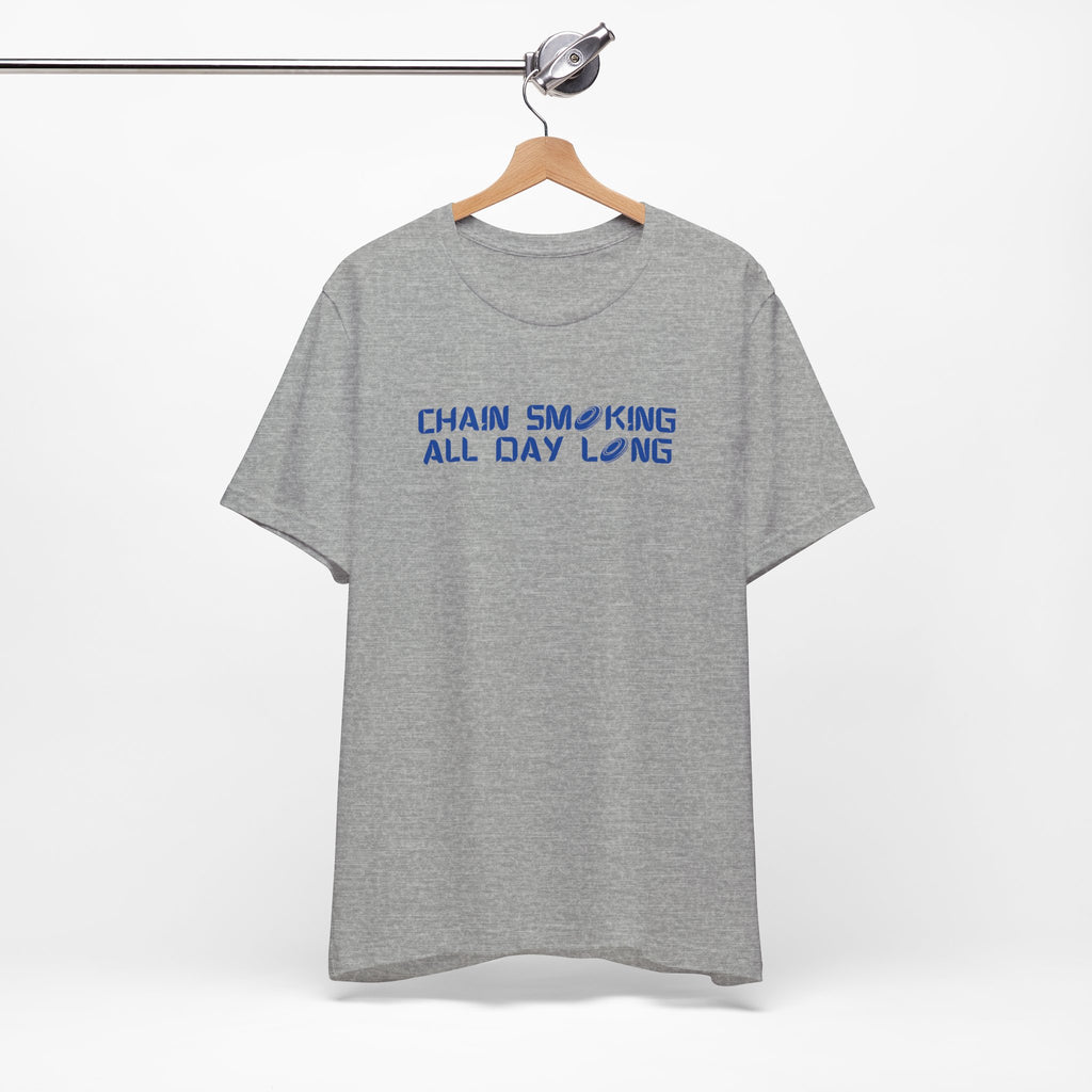 Gray t-shirt with 'CHAIN SMOKING ALL DAY LONG' text with the O's replaced by disc golf discs, on a hanger against a white background