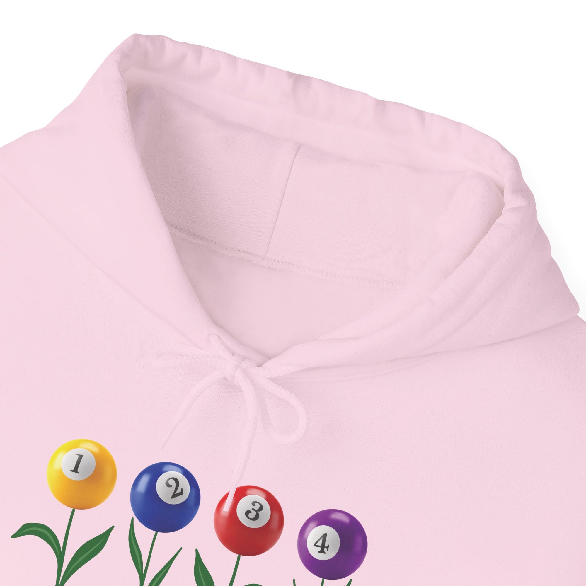 Close-up of the collar of a pink hoodie with four colorful flowers made out of billiards balls with green stems, a white background
