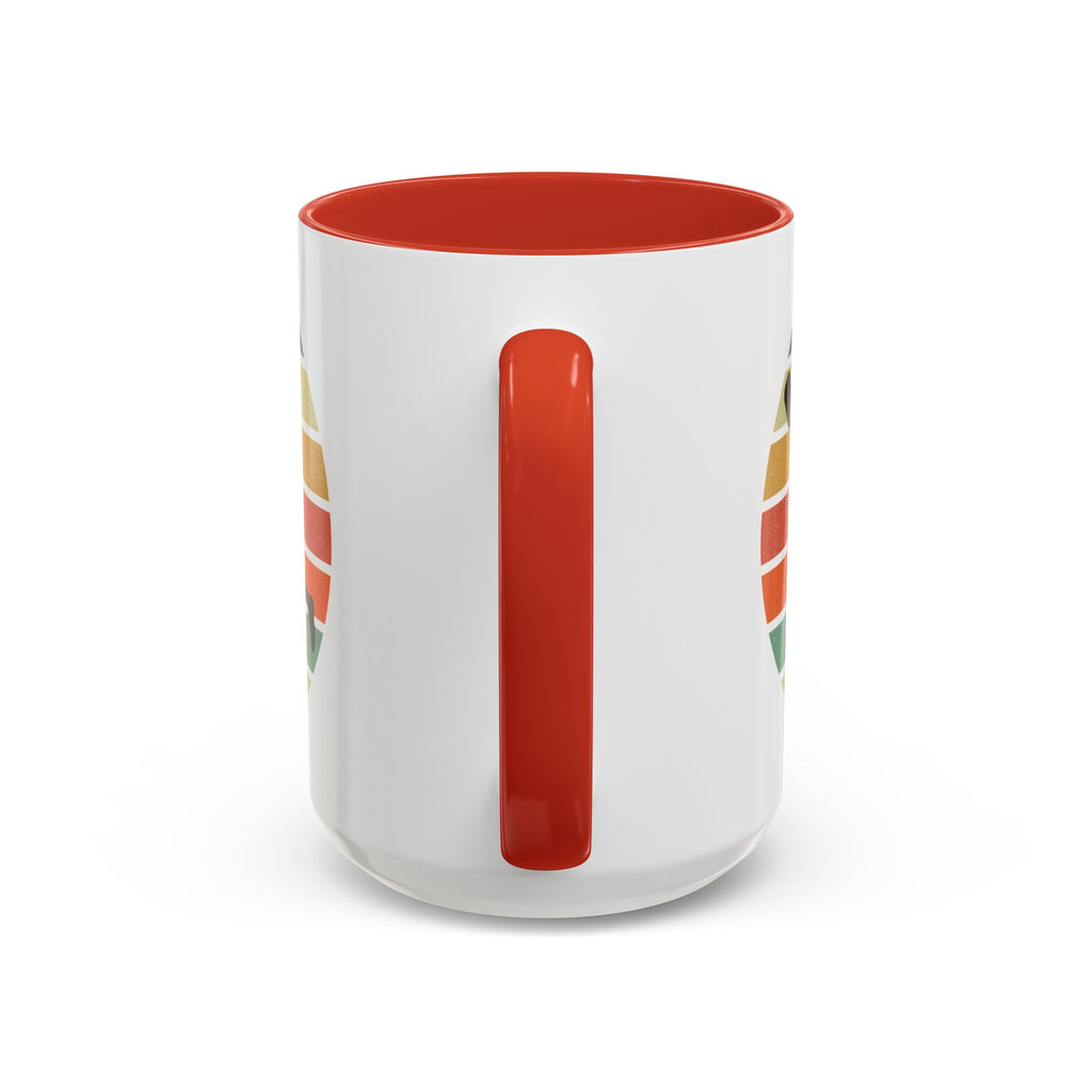 Coffee mug with red accent with a silhouette of a person playing pickleball against a colorful circular background on a white background.