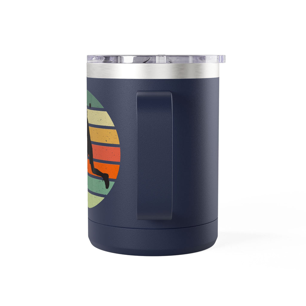 Navy blue mug with a graphic of a person's silhouette playing pickleball on a retro color background