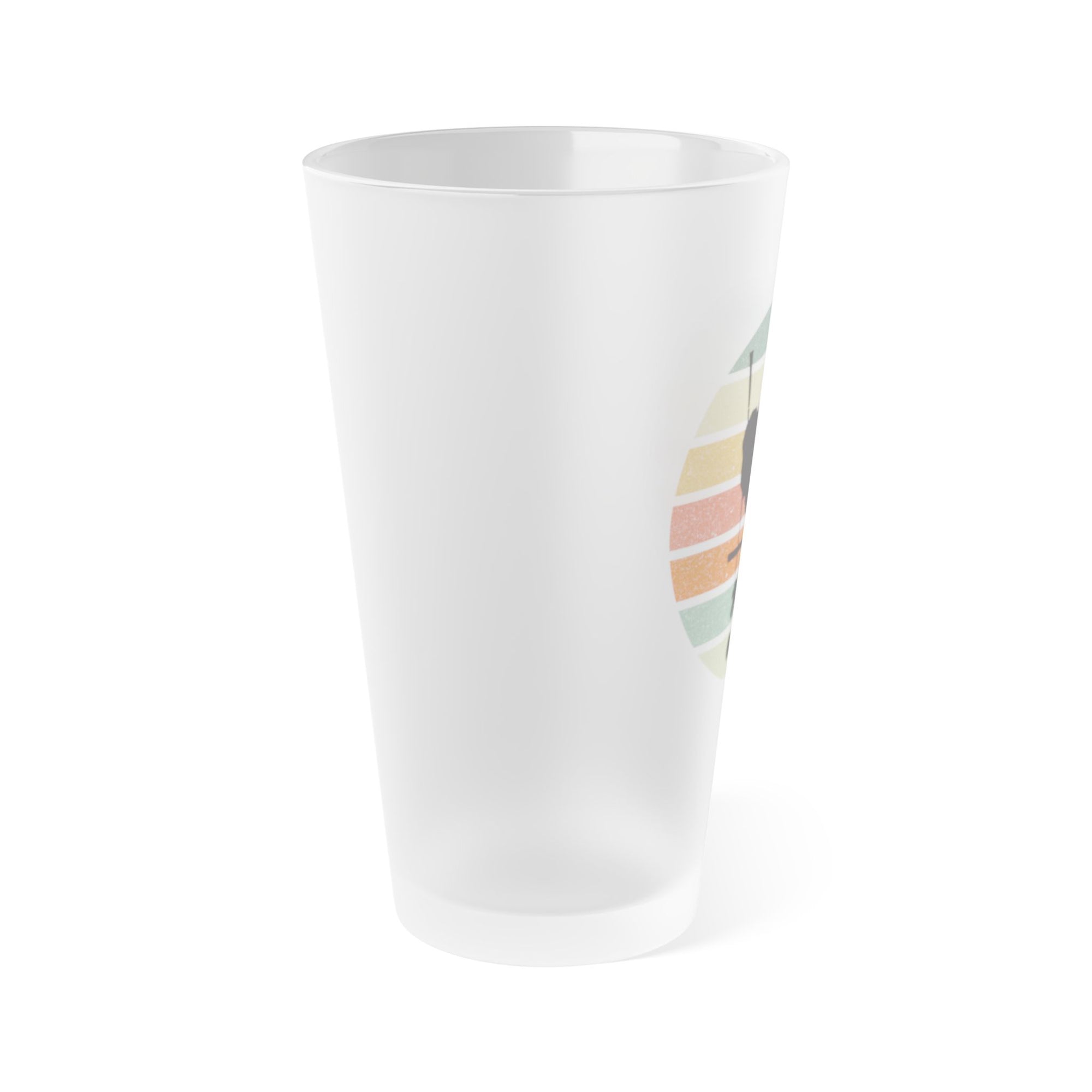 Side view of a frosted glass pint glass with a a silhouette of a billiards player over a circle of colorful lines on a white background