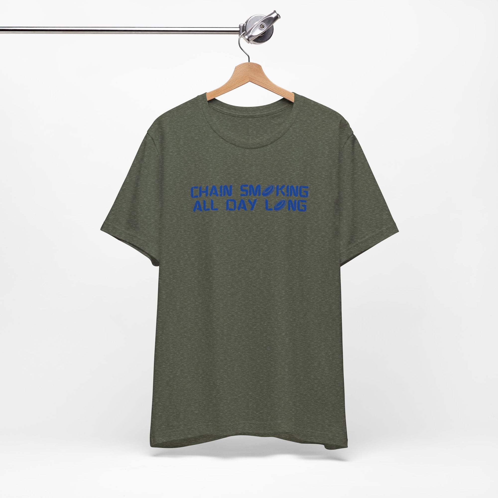 Military green t-shirt with 'CHAIN SMOKING ALL DAY LONG' text with the O's replaced by disc golf discs, on a hanger against a white background